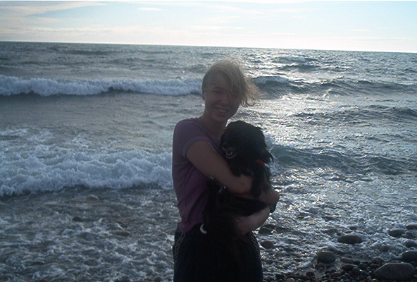 Gillian and Poochie last summer. I actually flipped this picture around with some imaging software. That one has better lighting than this one, I'll upload it later so you can decide.