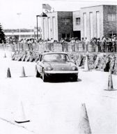 car navigating the obstacle course in front of City Hall