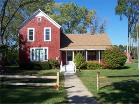 Front view of the historic Trager farmhouse at Countryside Park before renovation