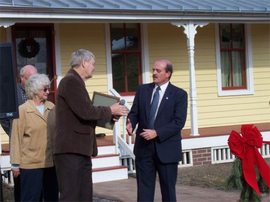 Mayor Olson getting a plaque