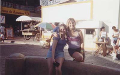 Me and Corinne in the marketplace after I got my hair braided