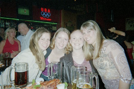 Me, Abbey, Carol, and Jill at Gators watching football and listening to Bender