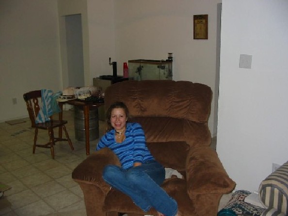 Sitting on Sam's chair trying to not cause any more problems