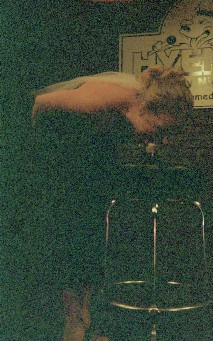 Karyn up on stage taking a blowjob.