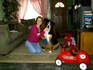 Leigh with their new dog, Mag, he is so big he can knock me over and pin me down without even knowing...