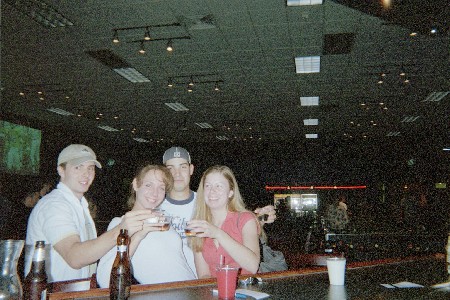 Nick, Beth, Chris, and myself are at Main Event about to do some shots after a good game of bowling.