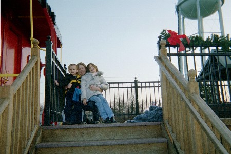 Nathan, Me, and Nicole checking out the trains after iceskating