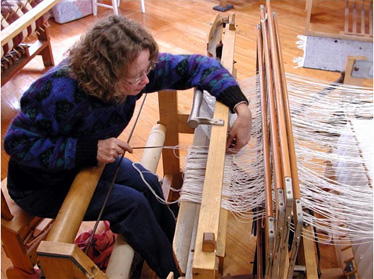 Weaving on Farm Museum Loom