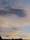 CloudedSunSetting-tall.JPG