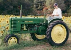 Kenny Jr. - on his John Deere