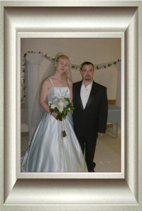 The happy couple pose for pictures.