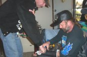 Dan and Jim removing Jim's cast...