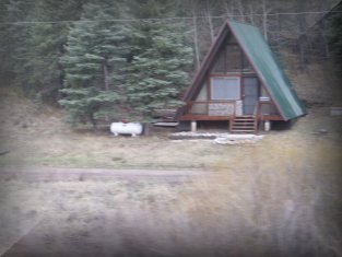A-frame cabin tucked along side I-70 eastbound.