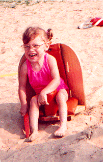 Emily in her corner chair at the beach