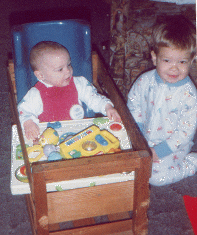 Emily in Feeder Seat in Crate on floor