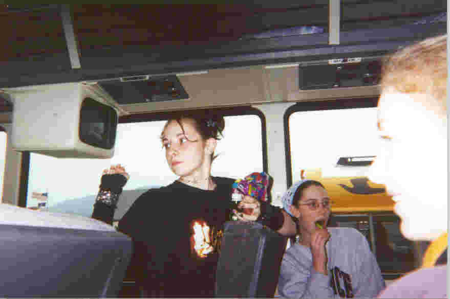 On the bus: Elise (with Lollis), Kate (eating lolli), Jen's head