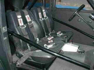 Roll cage painted, seats, harness and shifter installed