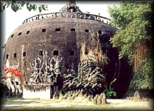 Heaven/Hell path - a very large construction in the form of a 'pot'. It holds a dark passage way that leads up to the top of the 'pot' - up top is heaven and in between is hell . . . try it for yourself at the Buddha Park