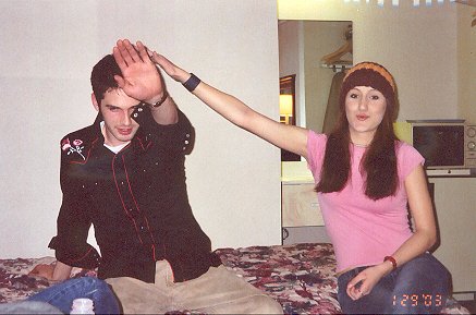 Tessa and Michael . . . pledging loyalty to the Nazi party or something.