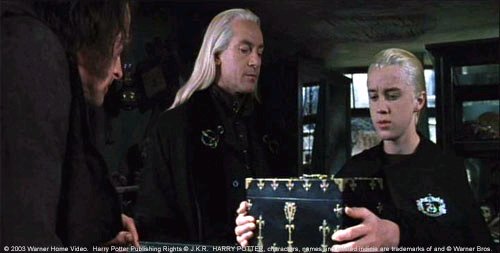 The Malfoys in Knockturn Alley