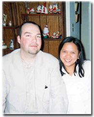 Robbie and Dina celebrating their 1st Christmas together