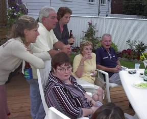 Jen looking on as everone talks