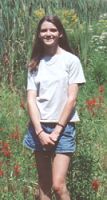 Courtney in a field