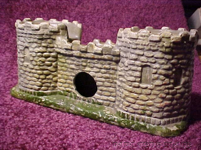 ...and it was meant as a light-up piece, as can be seen by the hole in the back and the paper-framed cellophane windows on the front as seen in the photo above. 