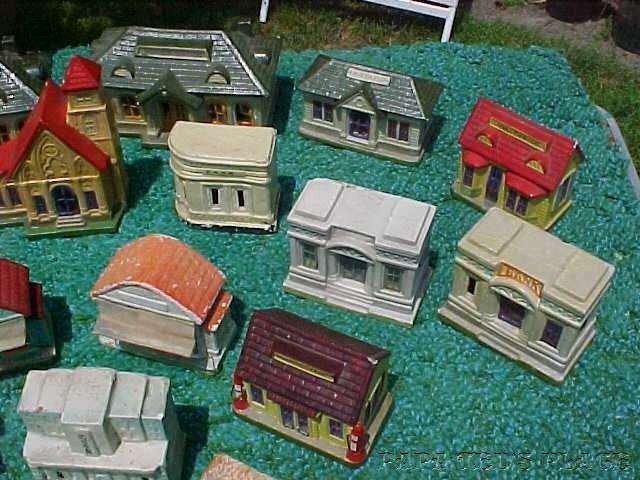 Some other COMPOS: Several different styles and sizes of railroad stations, movie houses and banks can be found in addition to the "basic 8. The little rounded "corner" bank is not seen all that often, or I would have a better one to show you! 