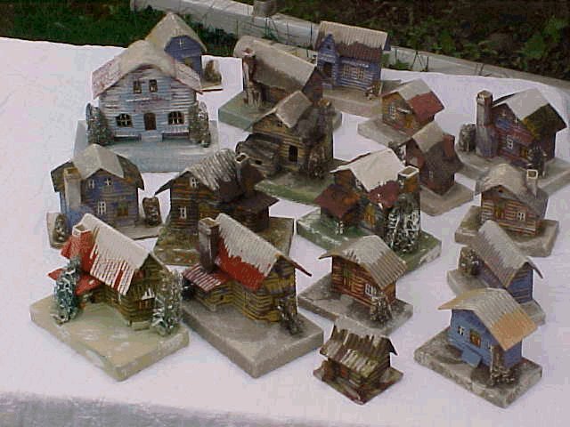 Some "LOGGIES" are actually a variety of GLOSSY TOP, having the shiny roofs in the beginning -the rural first cousins of the PRINTIES and G.T.'s. Some form of log cabin is found from the beginning right through to the bitter end in the early '60s when our Christmas stuff began coming from Taiwan - the single-faced corrugated carboard being a "natural" for the basis of the style.