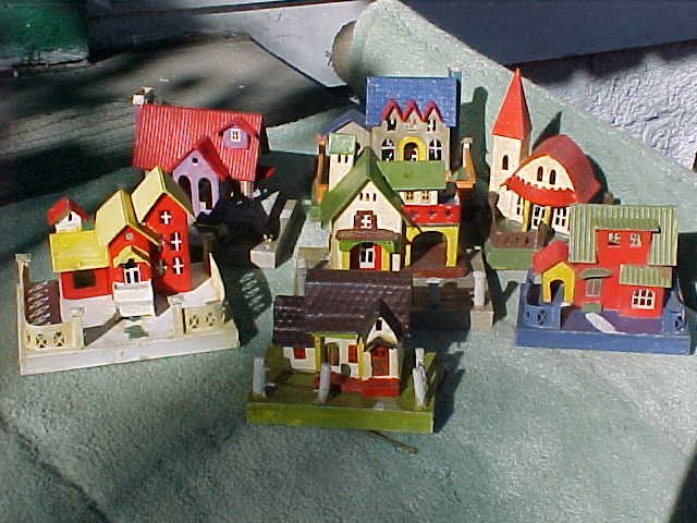 ANOTHER VIEW: The three smaller pieces are about the same size and very much like the LAQUERS above, but upon close inspection, all kinds of textural embossing of the cardboard - especially on the roofs -and other details set them apart. 