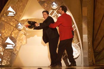  Jon gets frisked at the Grammys. I wonder how much that job paid?