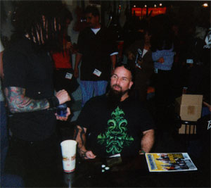 The King exchanging phone numbers with Rob Zombie guitarist Riggs