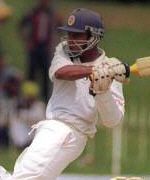 Mahela Jayawardene top-scored with 101 before England hit back