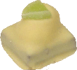 Fresh lime and cointreau whipped cream in white chocolate topped with a lime slice