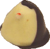 White mango ganache coated in a dark and white chocolate tuxedo