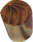 Hazelnut praline in a milk mabled cup
