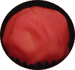 Strawberry ganache in a white shell rolled in pink chocolate