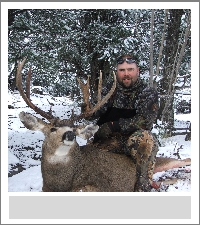 Bobby Meadows w/ Mule deer