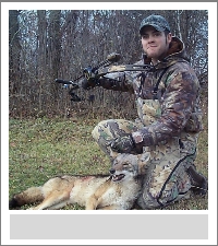 Shaun Ford with Coyote taken with bow in 2006
