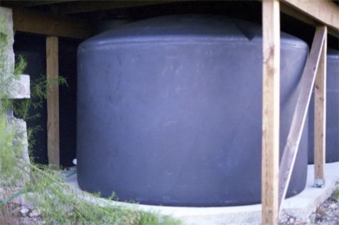 This 1550 Gallon Poly Tank Resides under Joel's House part of his 10 tank 15,500 Gallon Rainwater System