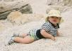 Megan liked picking up pretty stones and shells from the beach.