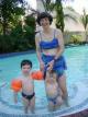 Tim and Megan wanted to play at the pool, so Pia put on her costume too.