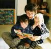 Pia reading a story to Tim and Megan (Little Goslings daycare).