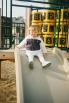 Feb 28, Oakland CA. Ready to go down the slide! She loves slides.