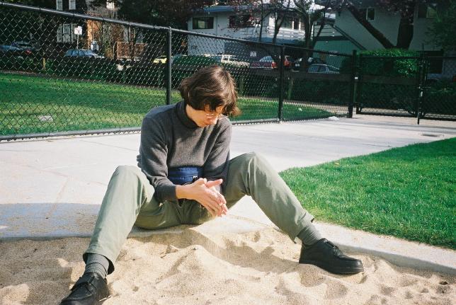 Feb 28.  Same playground; Pia waiting patiently while Tim and Megan play.