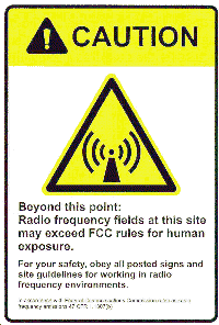 Sign: CAUTION Beyond this point: Radio frequency fields at this site may exceed FCC rules ...