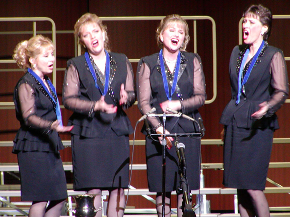 Heatwave just won and they're wearing their gold medals at Regional Competition 2002