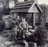 Myself and brother Giles on wishing well with Ollie