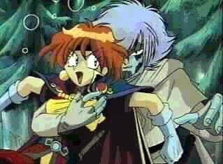 Zel looks rather, um, evil in this shot, but he's actually just about to pull Lina out of the way of an attack spell.&nbsp; However, she is rightly more concerned with his choice of hand-hold.